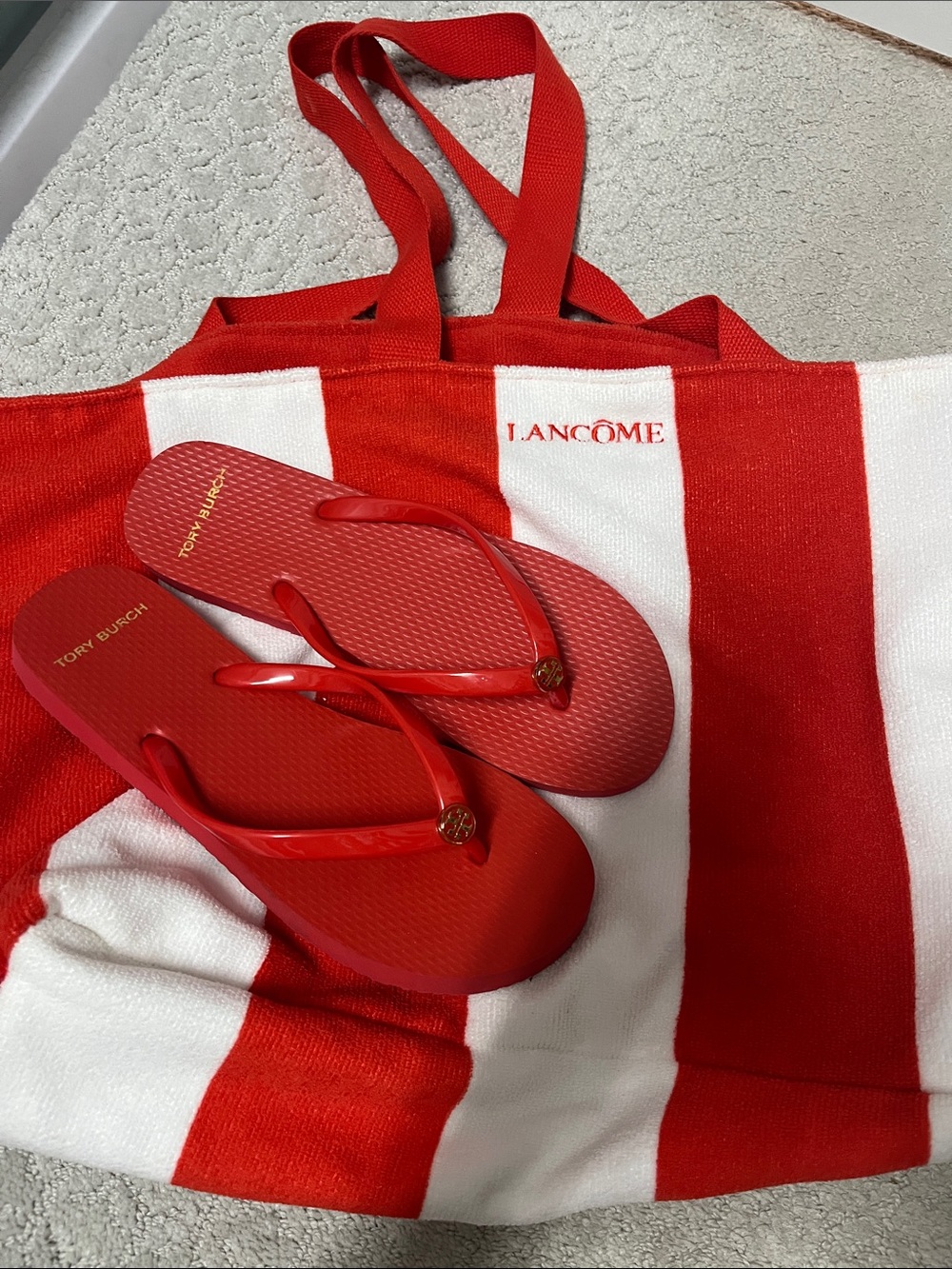 Tory Burch Flip Flops with Lancôme Red & White Striped Terry Cloth Tote